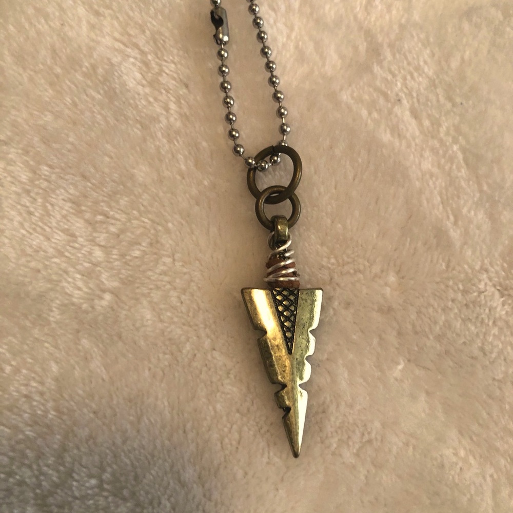 Gold arrowhead on silver ball chain